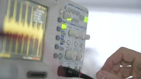 Electronics laboratory, Female hands in white lab coat diagnosing electronics Stock Footage 153985922