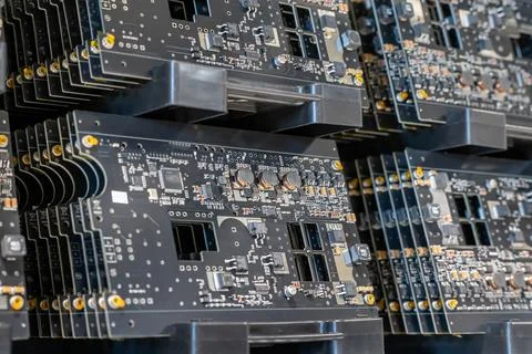 Electronics PCB boards in warehouse partly assembled Stock Photos