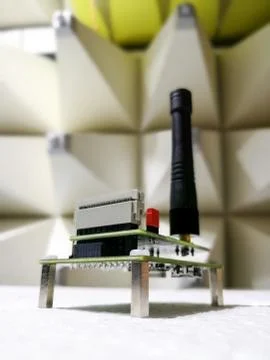 Electronics PCB with wireless communication module in anechoic chamber Stock Photos