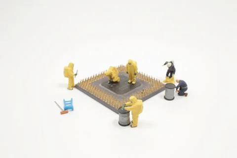 An Electronics Recycling Concept, Team of engineers repairing 写真素材