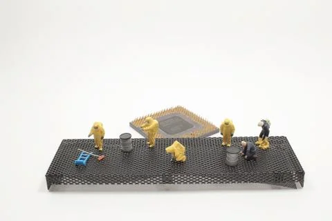 An Electronics Recycling Concept, Team of engineers repairing 写真素材