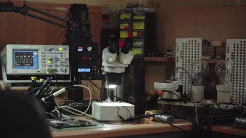 Electronics repair service workshop with soldering and diagnostics equopment Stock Footage 205538946
