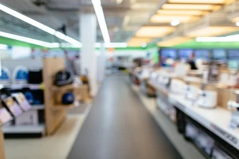 Electronics store blurred background. Electronics store in shopping mall Stock Photos
