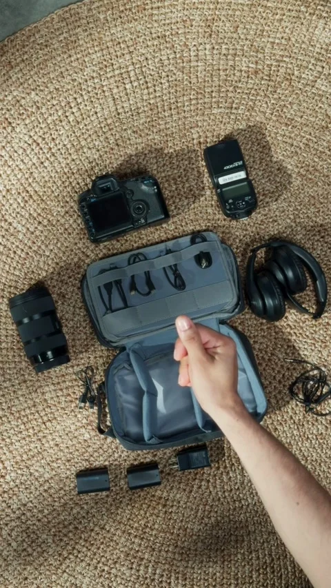 Electronics Surrounding a Bag, Workspace or Travel Tech Setup Concept Stock Footage 311703542