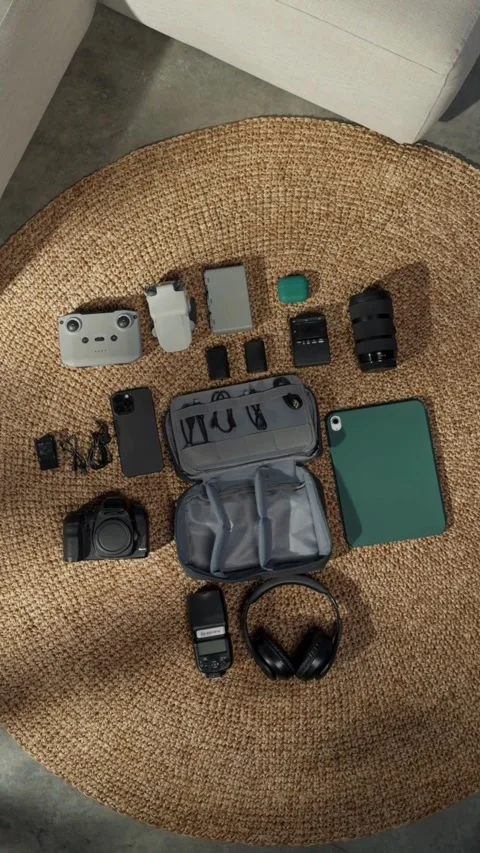 Electronics Surrounding a Bag, Workspace or Travel Tech Setup Concept Stock Footage 311704265