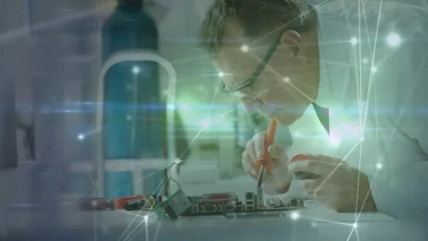 Electronics tech placing PCB, soldering joints and dispensing flux while overlay Stock Footage 312771522