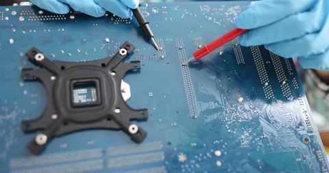 Electronics technician is testing computer chip closeup Stock Footage