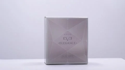 Elegance Avon. Box with Perfume bottle rotation in studio Stockbeeldmateriaal 171855855