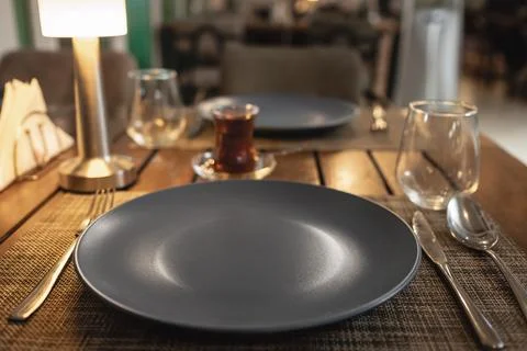 Elegance restaurant table set up for dinning. Stock Photos