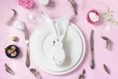 Elegance table setting spring pink flowers. Easter dinner. Stock Photos