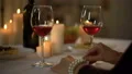 Elegant aged lady toasting and drinking red wine, romantic date in restaurant 4k or 4k+ Resolution