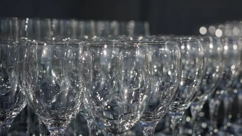 Elegant And Harmonious Setup Featuring Illuminated Wine Glasses With Sparkling Video stock 323775495