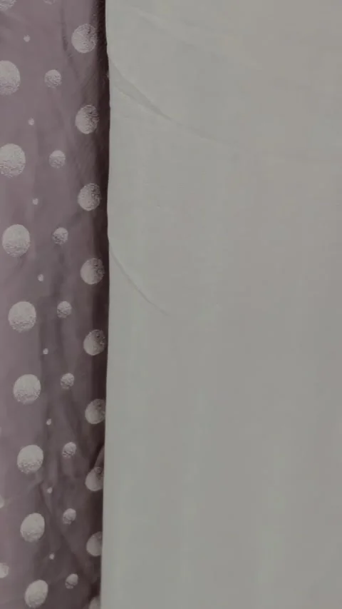 Elegant Array of Fabrics Revealing Intricate Patterns and Soft Textures Stock Footage 341068488