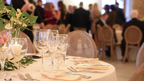 Elegant Banquet Table Setting at Upscale Event Reception with Guests Socializing Stock Footage 336320330