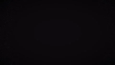 Elegant black background with subtle, expanding white dot animation Stock Footage 323261845