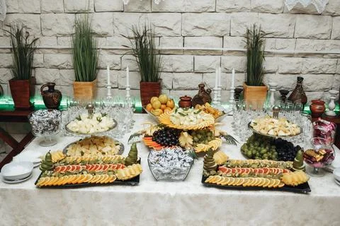 Elegant buffet spread on marble table Fotos de archivo