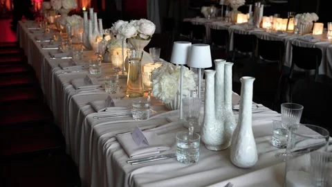 Elegant Candlelit Table Setting for a Wedding or Formal Event Reception Stock Footage 337435038