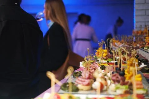 Elegant catering service showcasing an array of colorful snacks on a beautifully Stock Photos