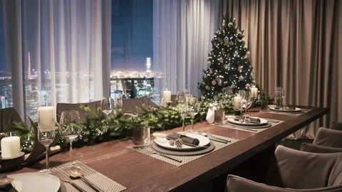 Elegant Christmas Dinner Table with City Skyline View Stock Footage 337464129