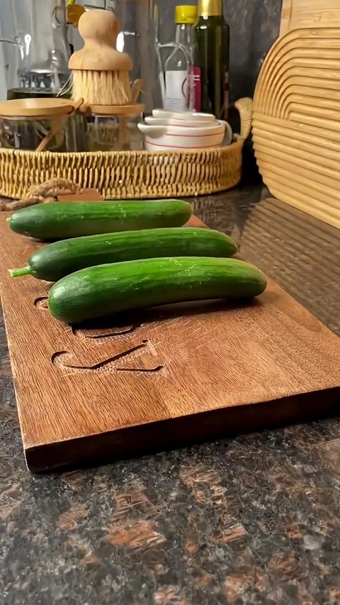 Elegant Cucumber Appetizer Preparation for a Summer Party Stock Footage 343605642
