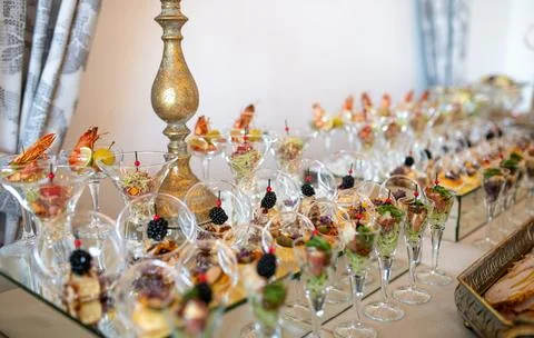 Elegant Culinary Display Featuring Assorted Appetizers in Glassware for Wed.. Stock Photos