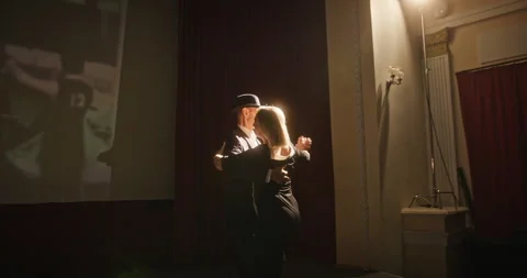 An Elegant Dance Performance Enhanced by Stunning Vintage Projection Techniques Video stock 305086023