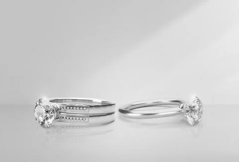 Elegant diamond ring on light background with shadows Stock Illustration