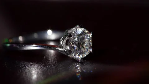Elegant Diamond Silver Ring Illuminated In Artistic Macro Refined Highlights Stock Footage 334698822