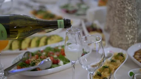 An Elegant Dining Experience Featuring Exquisite Wine and Gourmet Culinary Stock Footage 314575575