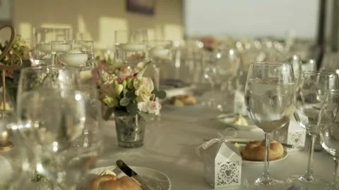 Elegant dining setup at a rooftop venue for a special event in the evening Video stock 291690362