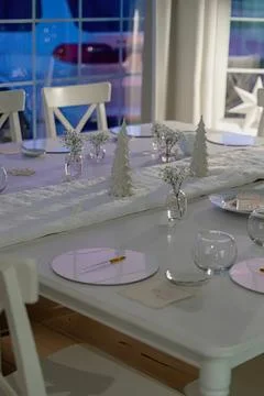 Elegant dining table set with candles and decorations Stock Photos