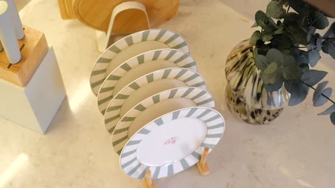 Elegant dinnerware display with decorative accents Stock Footage 313104146