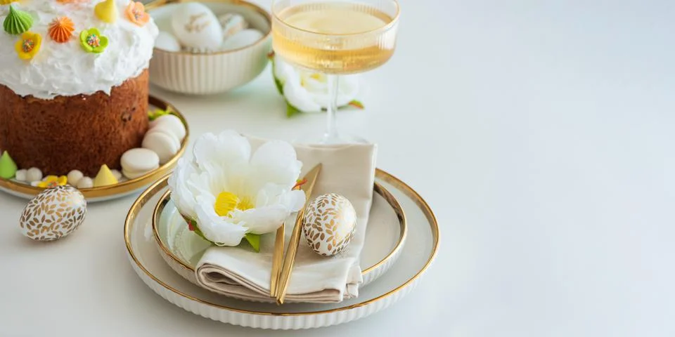 Elegant Easter Table Setting with Decorative Egg and Spring Details Stock Photos