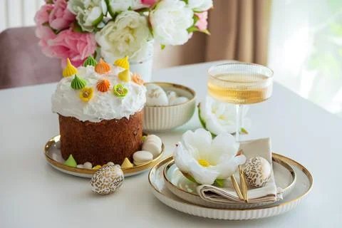 Elegant Easter Table Setting with Decorative Egg and Spring Details Stock Photos