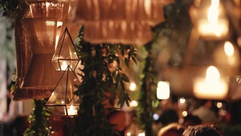 Elegant Event Decor: String Lights and Glass Terrariums Stock Footage 339269688