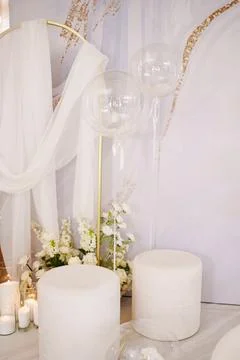 Elegant event setup with soft decor and flowers Stock Photos