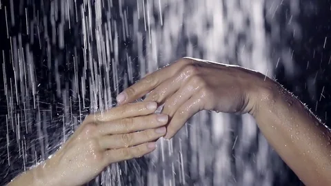 Elegant female hands with beautiful long fingers caress each other under the Stock Footage