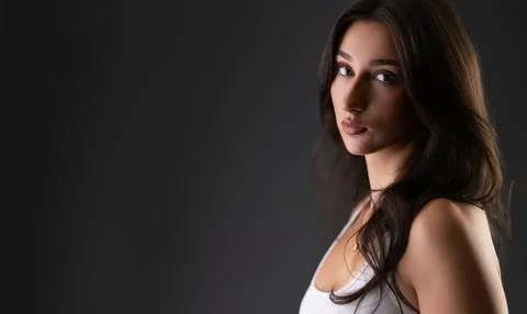 Elegant female model posing in studio portrait Stock Photos
