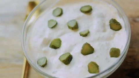 Elegant focused kitchen: presenting finished creamy pickle sauce Stock Photos
