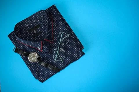 Elegant Formal Accessories with Patterned Bow Tie and Classic Men's Watch Stock Photos