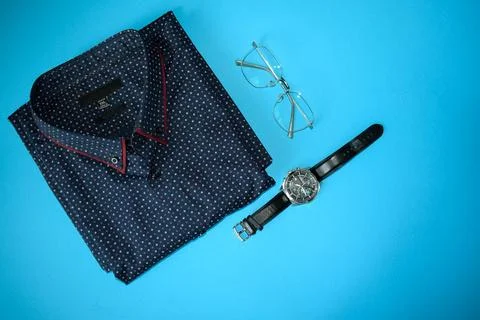 Elegant Formal Accessories with Patterned Bow Tie and Classic Men's Watch Stock Photos