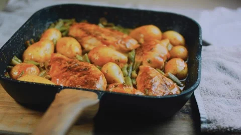 Elegant fresh assembly: showing a complete honey mustard skillet dinner Stock Footage 342180799