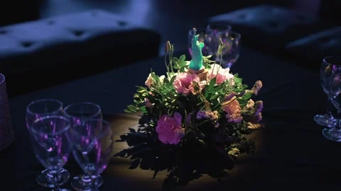 Elegant Gala Reception Table With Floral Arrangement and Empty Glasses Ready Stock Footage 332090641