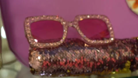 Elegant glasses with frames covered with rhinestones in an optical shop Video stock 201539758
