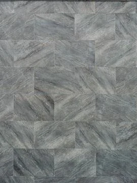 Elegant Gray Chevron Patterned Tile Flooring Stock Photos