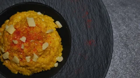 Elegant Grey Plate with Saffron Risotto alla Milanese and with Parmesan Cheese 스톡 동영상 265058486