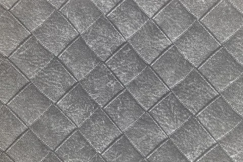 Elegant Grey Quilted Pattern Wall Surface - Seamless Modern Textile Look 写真素材
