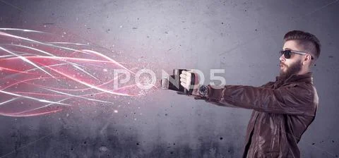 Elegant hipster with camera and bright lines Stock Photos
