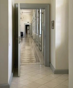 Elegant Interior Corridor with Classical Lighting and Flooring A beautifully des Stock Photos