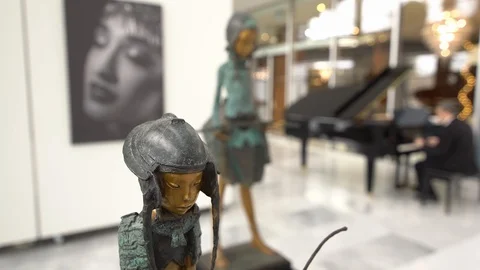 Elegant interior, figures, man playing piano. Stock-Footage 116346689